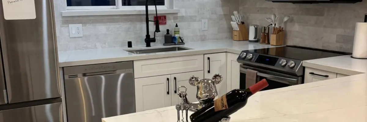 White kitchen with marble counters after cleaning