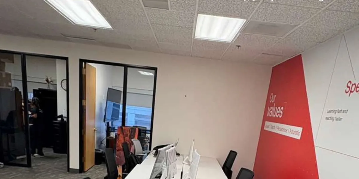 Open office with white desks after cleaning