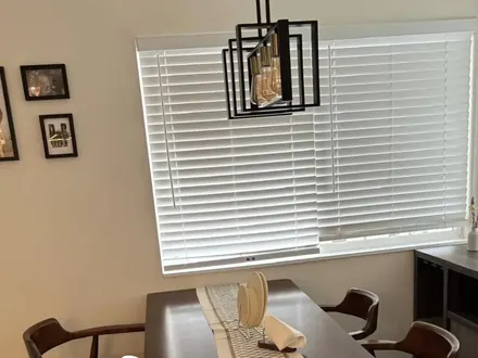 Dining room with clean window blinds